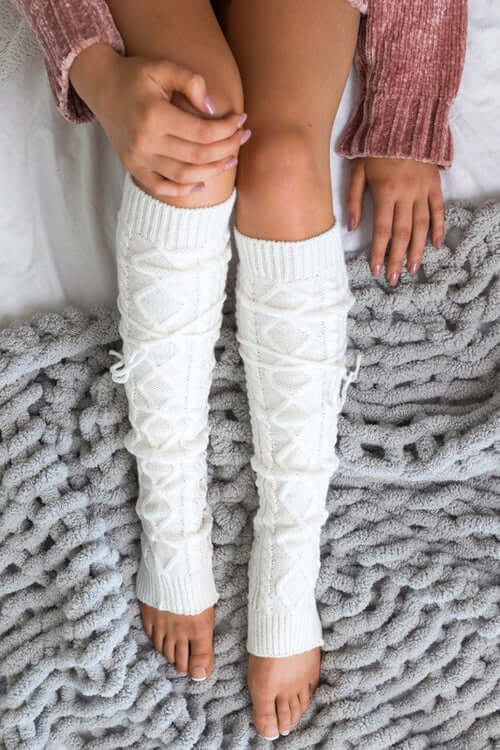 Cable Knit Long Tie Leg Warmer in white, featuring removable ties and a cozy knitted pattern.