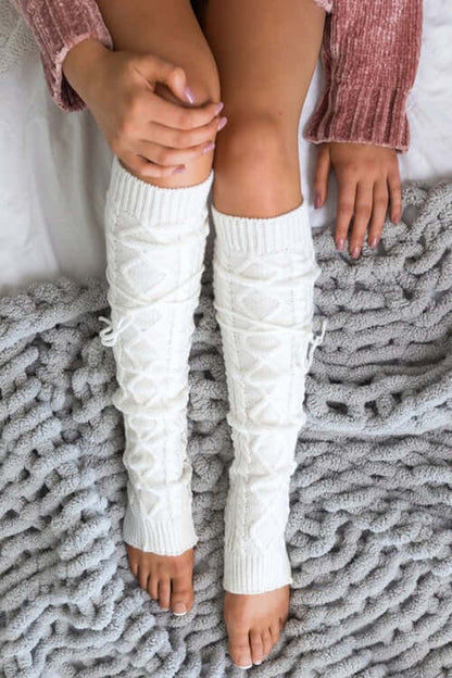 Cable Knit Long Tie Leg Warmer in white, featuring removable ties and a cozy knitted pattern.
