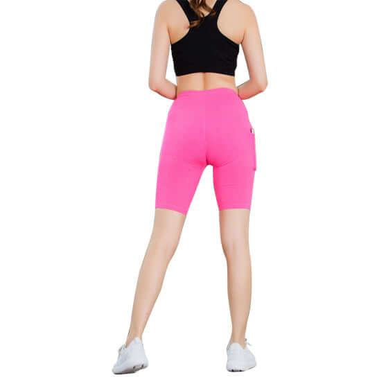 All Seasons Yoga Shorts Stretchable With Phone Pocket in bright pink, ideal for workouts and casual wear.