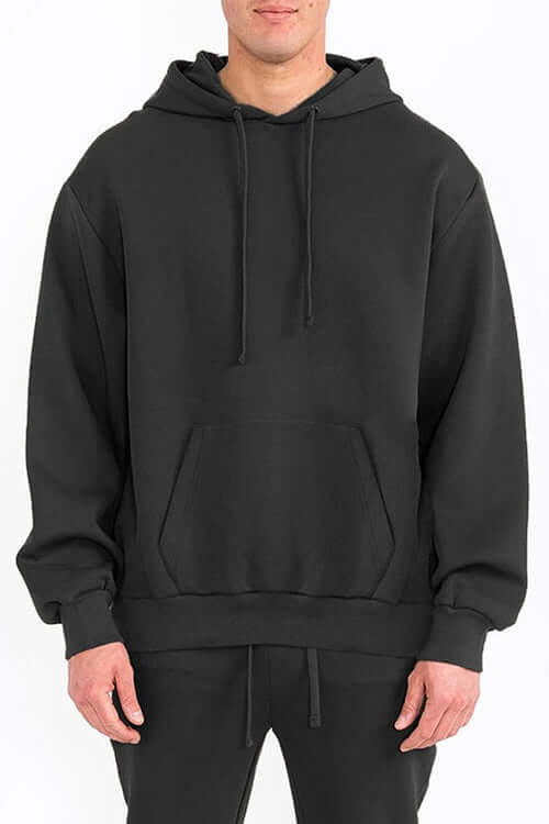 Mens Solid Tech Fleece Hoodie – Comfort Meets Everyday Style worn by a model in black color.