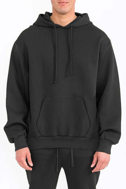 Mens Solid Tech Fleece Hoodie – Comfort Meets Everyday Style worn by a model in black color.