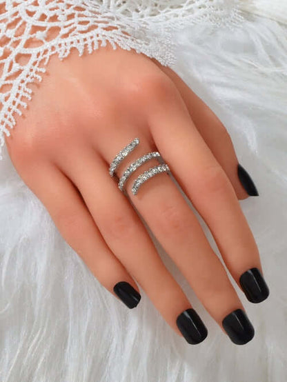 Bridal Jewelry Full Rhinestone Engagement Ring on a model's hand with elegant black nails and lace details.