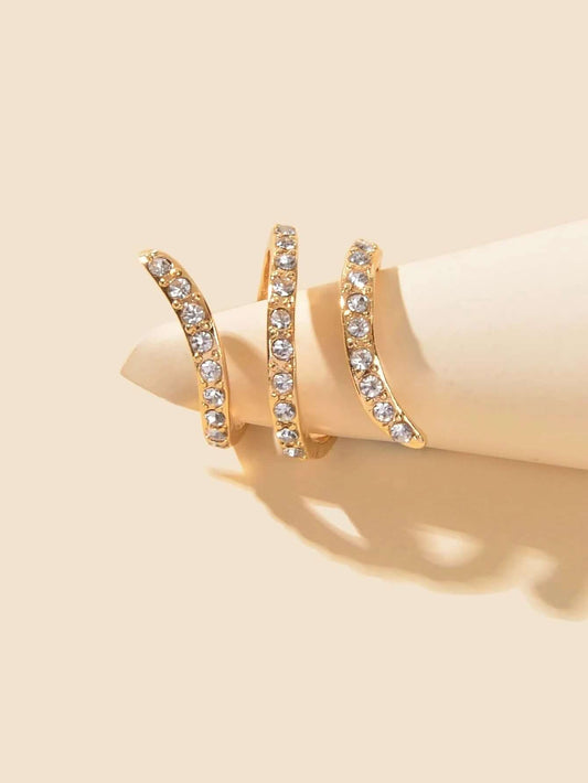 Bridal Jewelry Full Rhinestone Engagement Ring displayed elegantly with sparkling rhinestones and a unique spiral design.