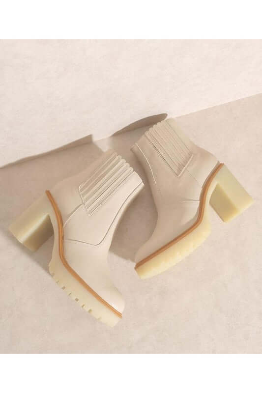 ANASTASIA- PANELED BOOTS FOR WOMEN'S in cream color with stylish heel and modern design.