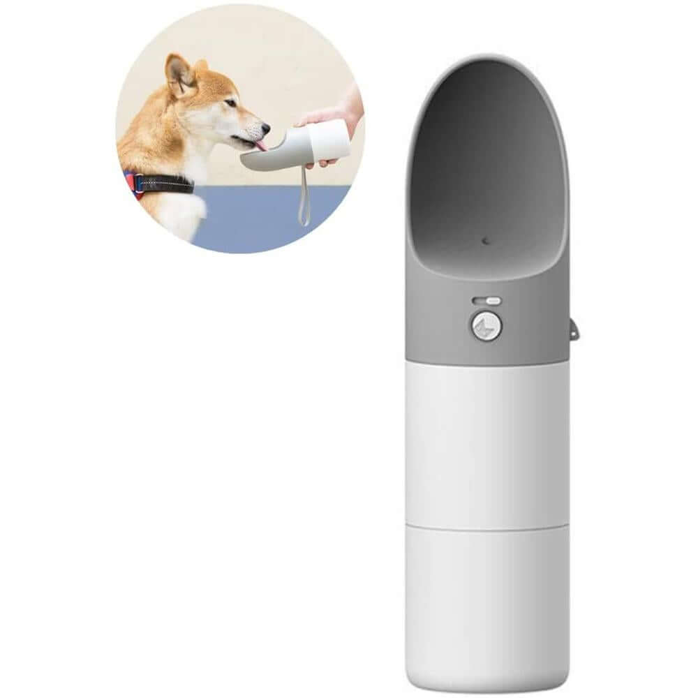 Instachew Rover Pet Travel Bottle, Dog water bottle in white with dog drinking from it.