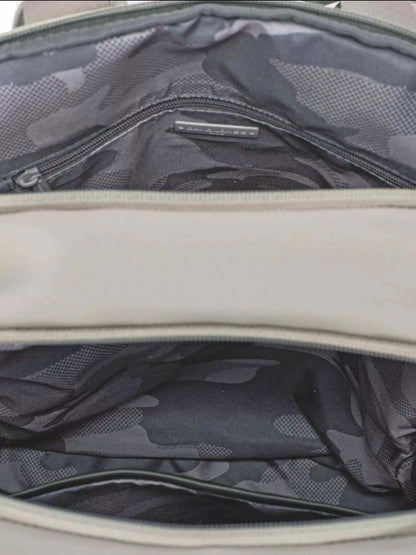 Interior view of the David Jones Canvas Backpack Bag with Dual Handle, featuring a spacious design and zippered compartment.