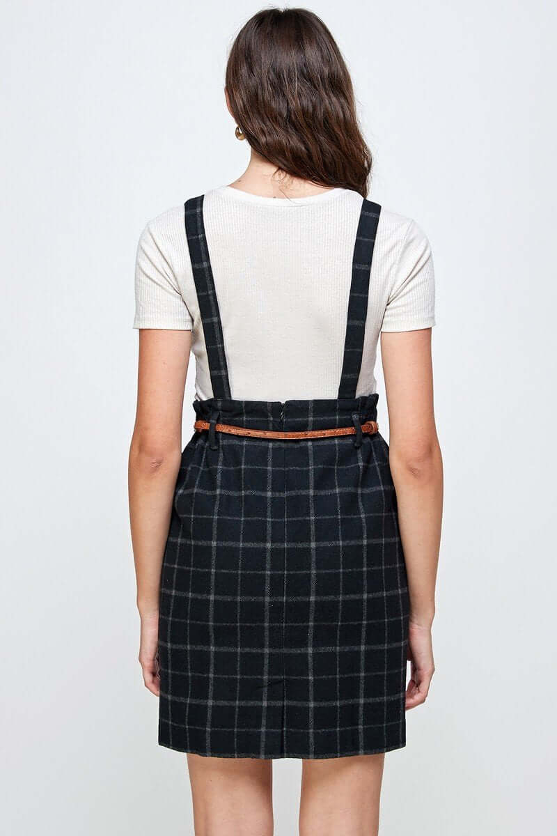 Plaid Suspender Skirt with Belt Detail seen from the back, highlighting its chic design and structured fit.