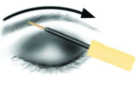Application of Eyelash Growth Serum LuRey Lash on a model's eyelash to enhance length and thickness.