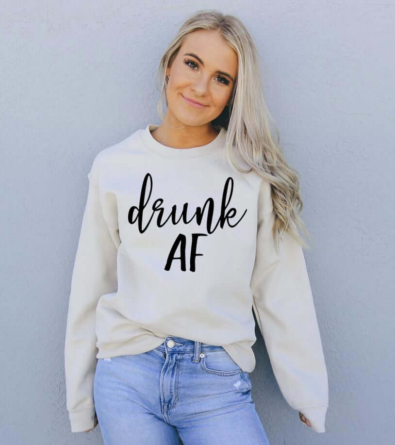 Model wearing a stylish Drunk AF Sweatshirt with a crew neck and relaxed fit, perfect for casual wear.