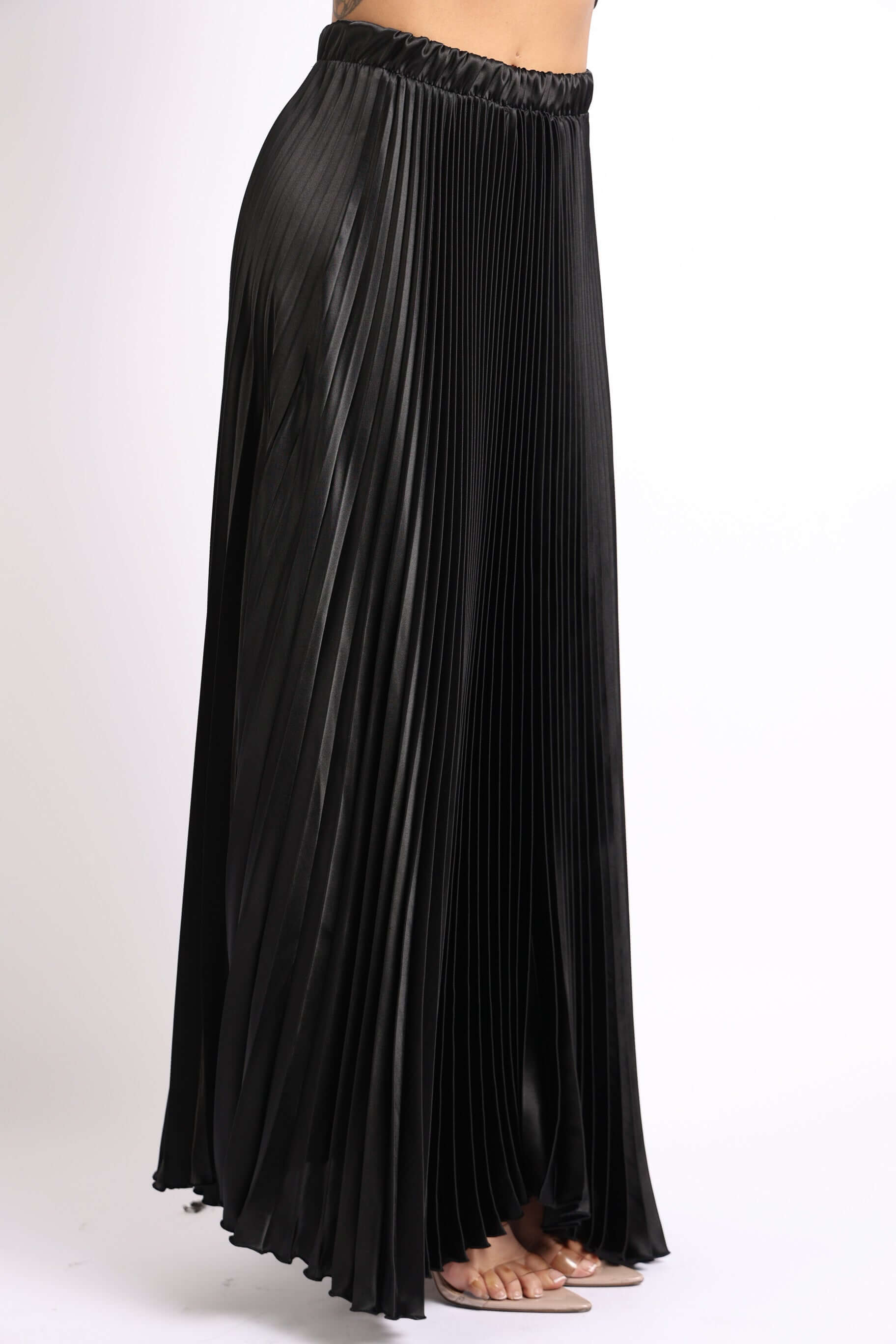 Elastic High Waist A-Line Pleated Satin Maxi Skirt Formal Prom BLACK displayed on model, showcasing its elegant pleats.