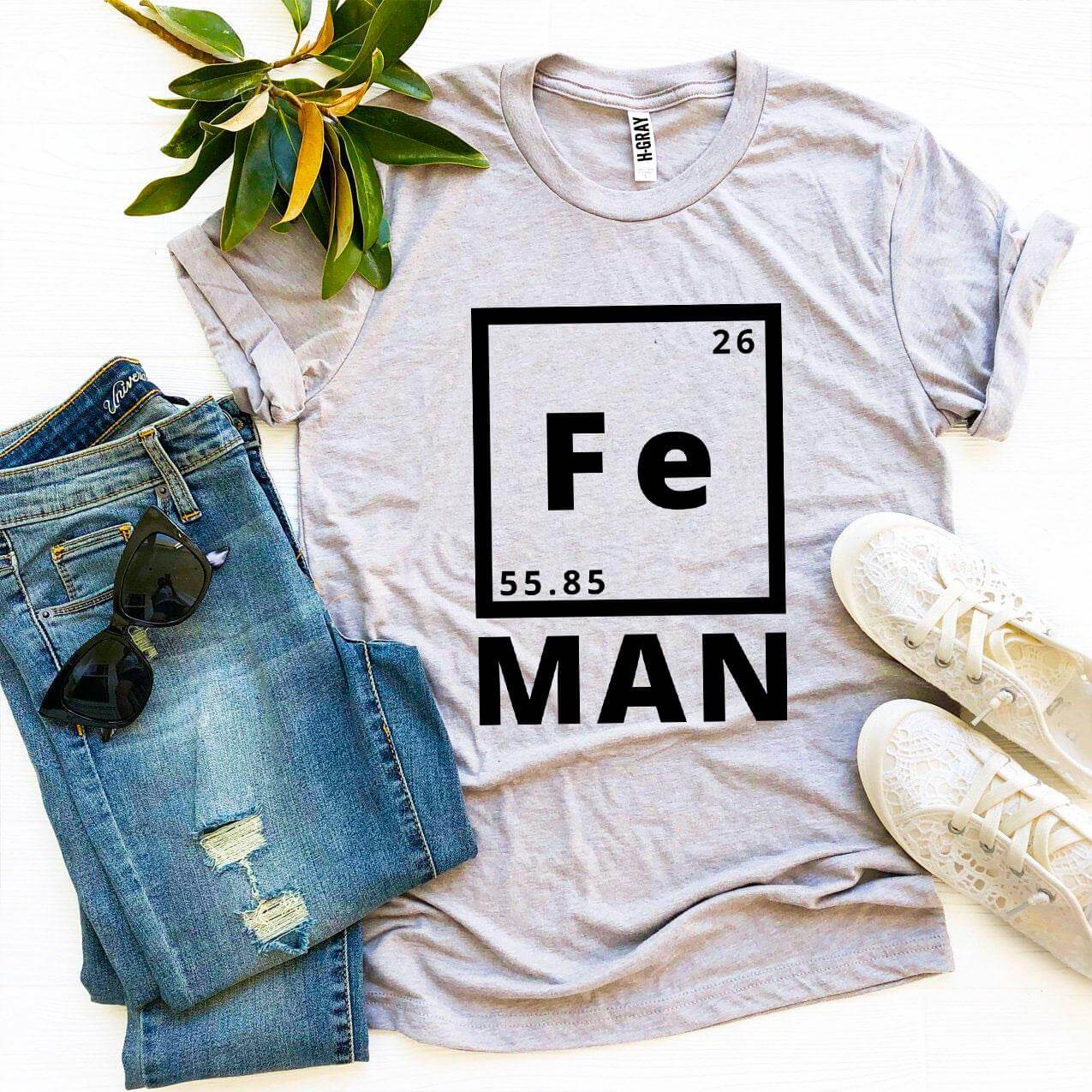 Iron Man T-shirt featuring a grey design with scientific element Fe and the word MAN.