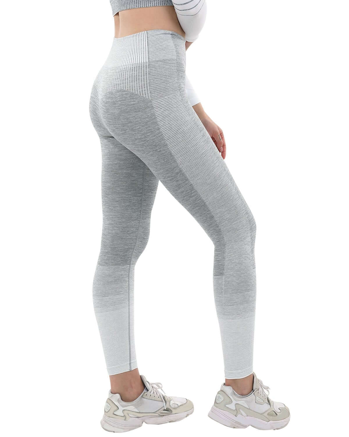 Bocana Seamless Leggings - Grey & White showcased on a model from the side, emphasizing their high-waisted fit and seamless design.