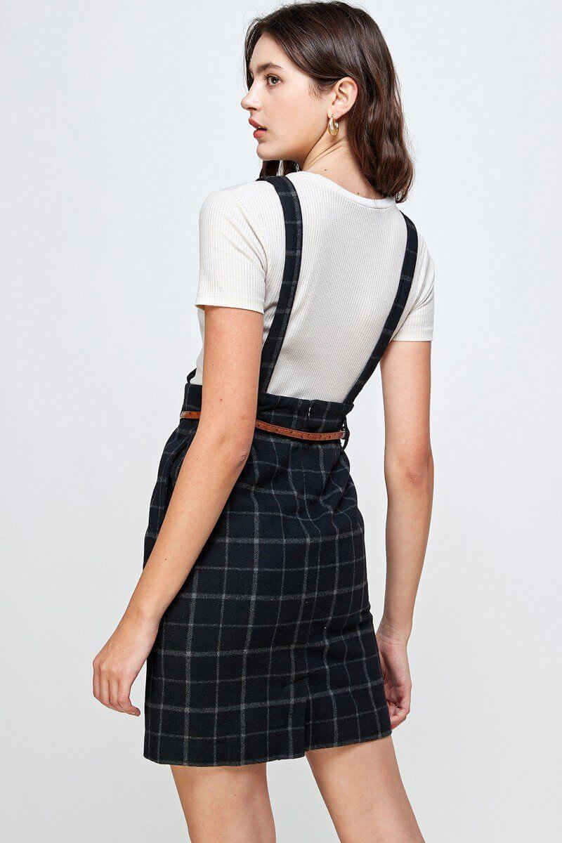Plaid Suspender Skirt with Belt Detail worn by a model showcasing back view with high waist and structured fit.